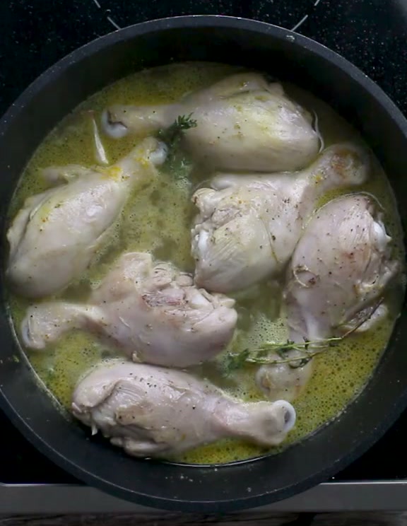 Chicken drumsticks simmered in a turmeric and thyme broth until tender