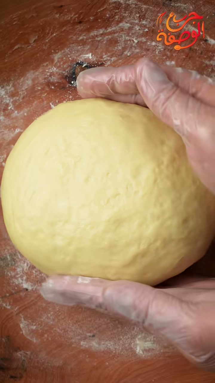 A smooth, soft ball of brioche dough after kneading
